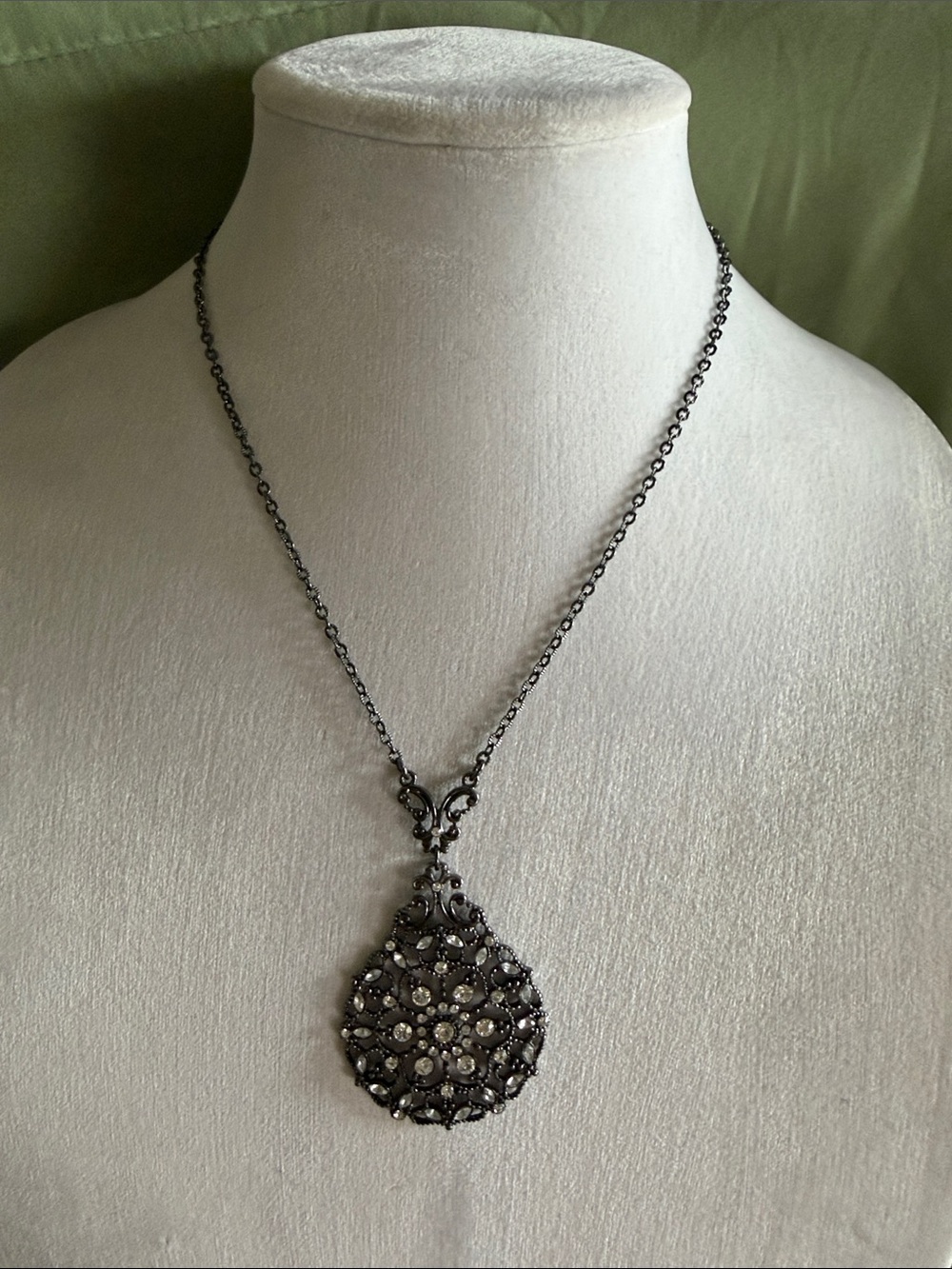 Gunmetal Filigree Teardrop Pendant Necklace with Clear Stones